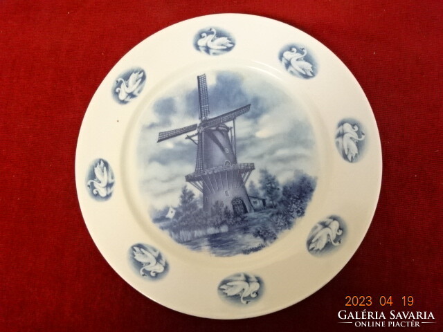 Porcelain flat plate with a water mill in the middle and a pair of swans on the edge. Jokai.