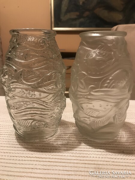A pair of glass vases with a sea pattern