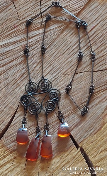 Handmade metal necklace with amber pendants