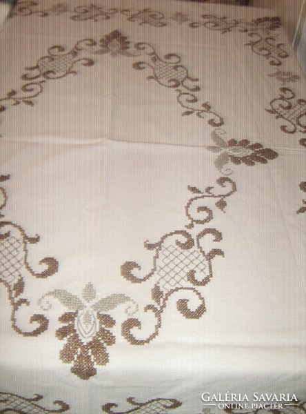 Beautiful hand-embroidered woven tablecloth with a baroque pattern