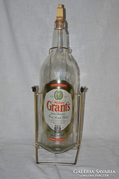 Grant's scotch whiskey bottle with holder