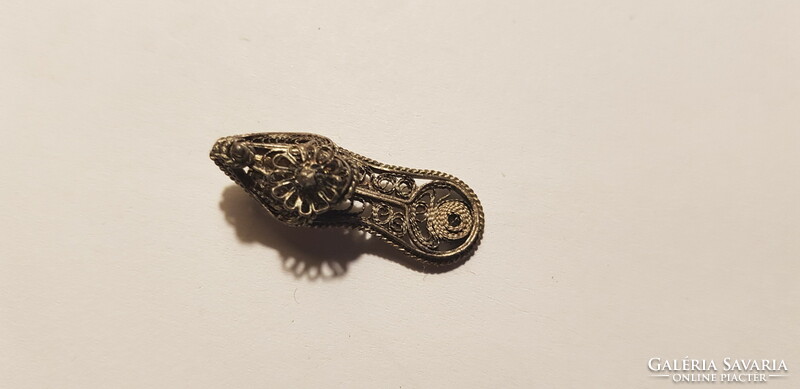 Filigree slipper pendant is an old piece