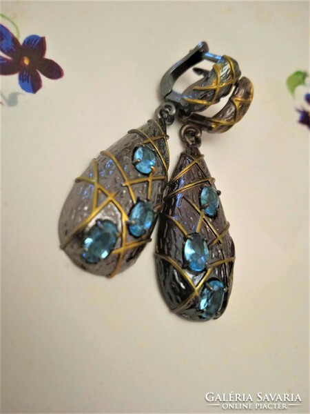 Beautiful handmade earrings with blue stones.