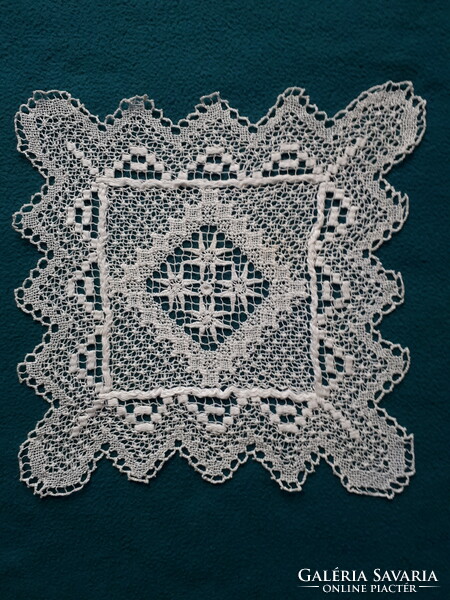 Sewn lace spreader