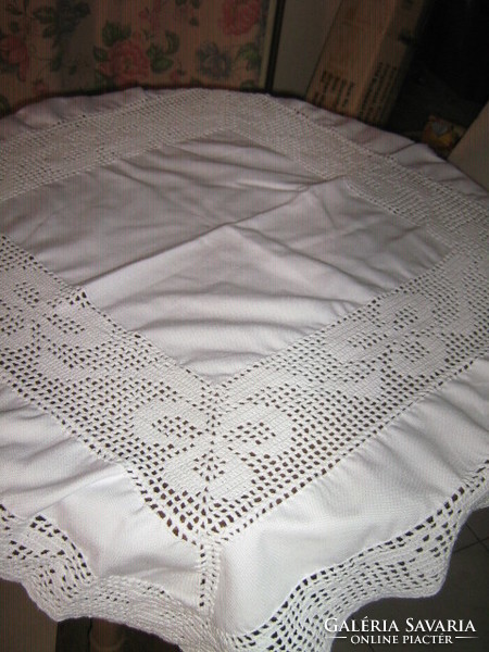 Beautiful hand-crocheted tablecloth with inset and crocheted edges