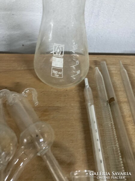 Old milk measuring bottles