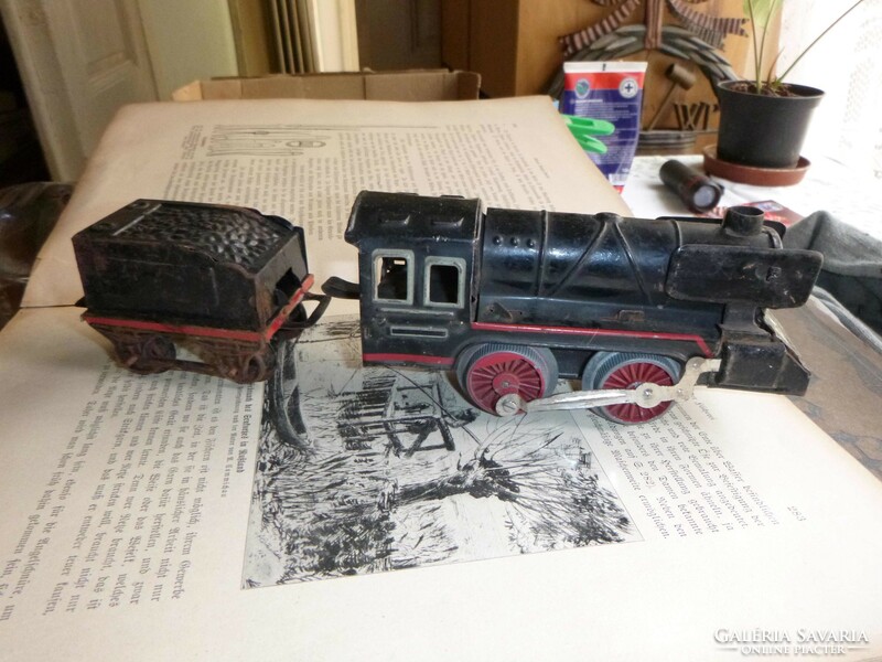 Toy train, steamer, maybe distiller