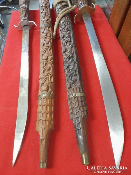 Hand-carved wooden, metal-bladed sword, decorative sword.