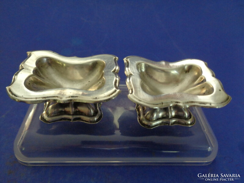 A pair of silver spice holders from 1867