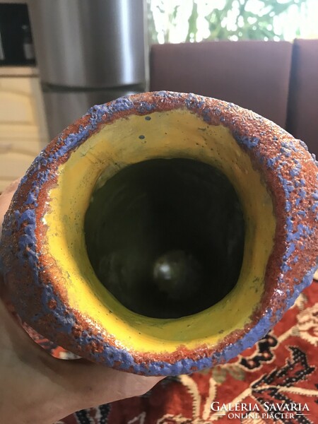 A large ceramic vase with a beautiful bright glaze