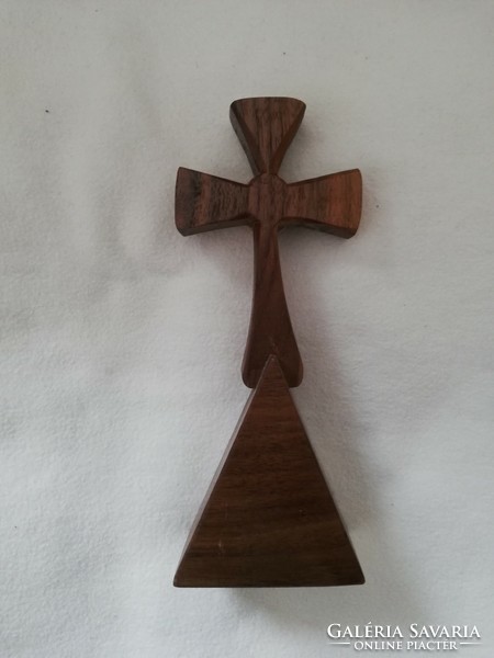 Wooden cross with a ruby-colored stone
