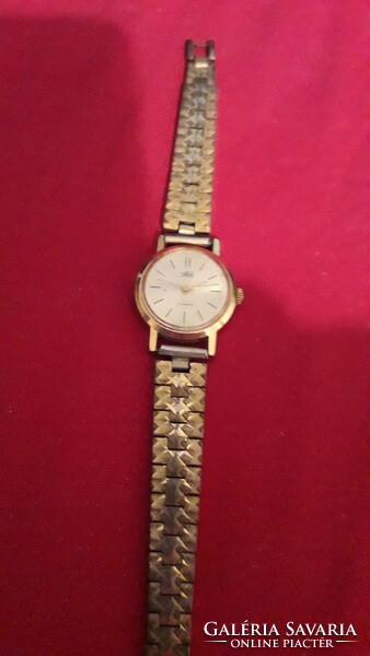 Old Zarja Russian vintage women's watch with 21 stone mechanism with gold-plated strap overstretched as shown in pictures