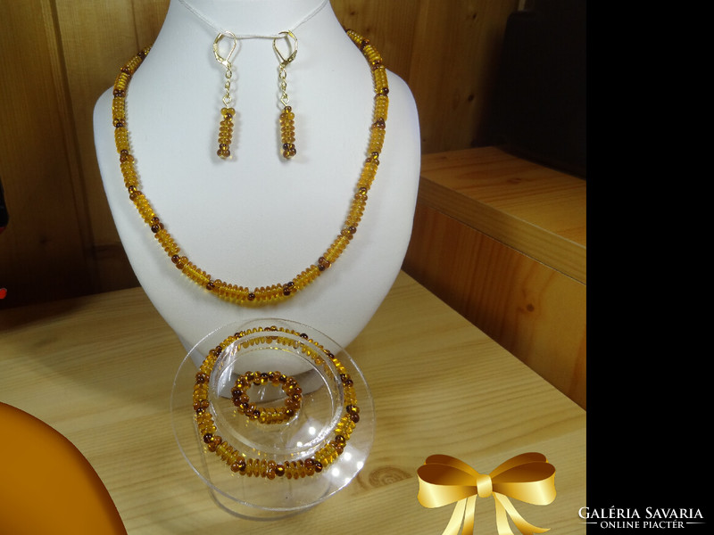 Jewelry set made of Czech glass beads. Necklace, bracelet, earrings and ring. Beautiful honey color.
