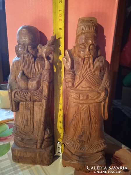 Carved wooden sculptures together