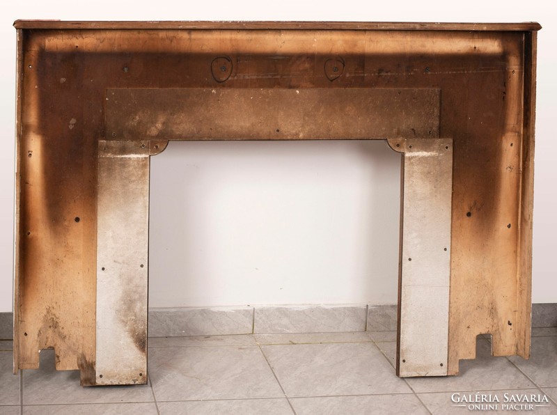Carved, painted fireplace frame with plastic figures