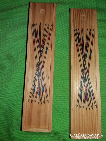Retro wooden mikado skill game with sticks in a wooden box, unplayed according to the pictures