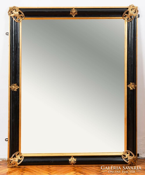 Large black framed mirror with gilded copper stripes