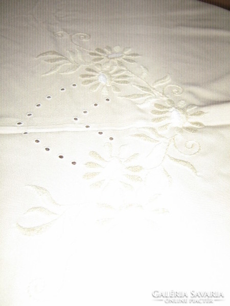 Beautiful hand-embroidered elegant cream-colored tablecloth