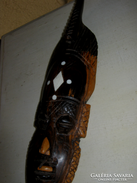 Carved wooden wall mask