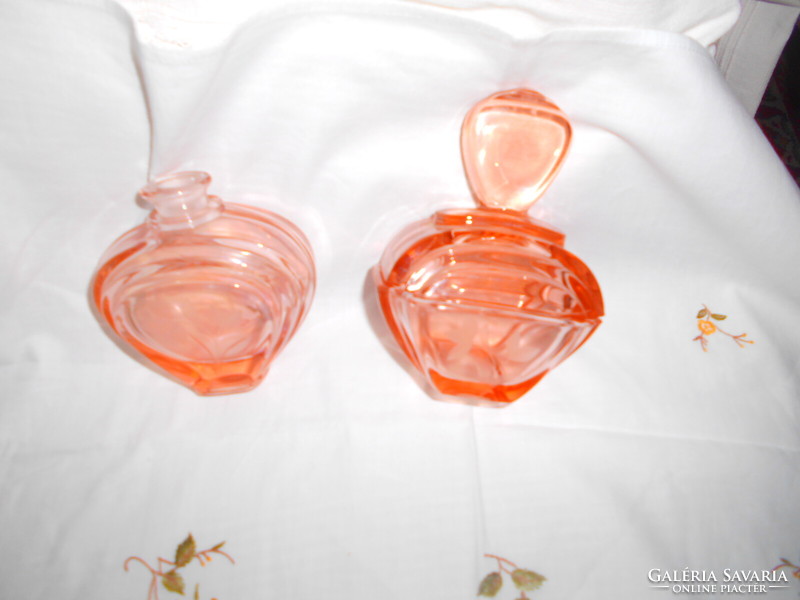 2 pink perfume bottles