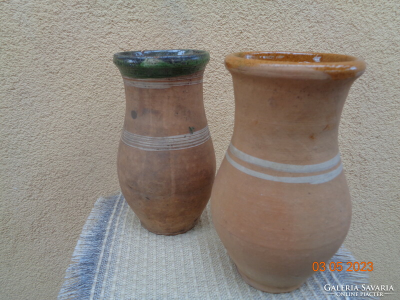 Old Obanya milk jugs, 19 cm, crack on one
