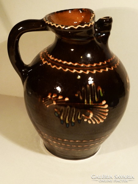 Old, large, glazed ceramic jug
