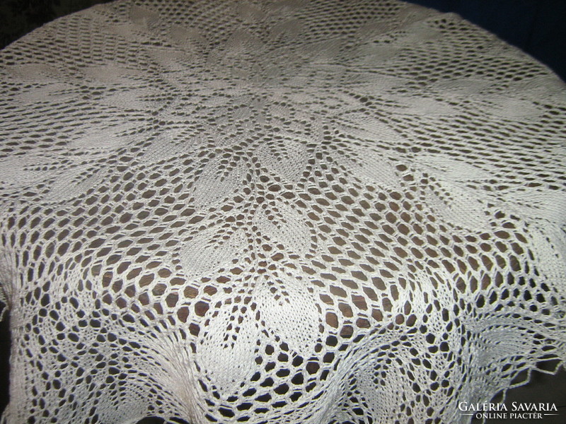 Beautiful crocheted antique white round lace tablecloth