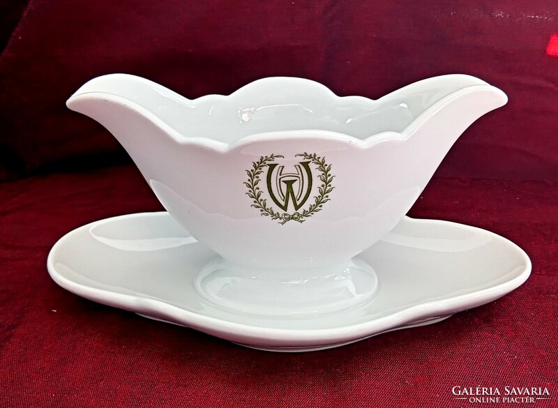 White porcelain sauce bowl with monogram and laurel wreath