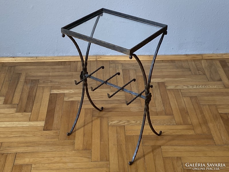 Nicely shaped, practical wrought iron side table with glass top