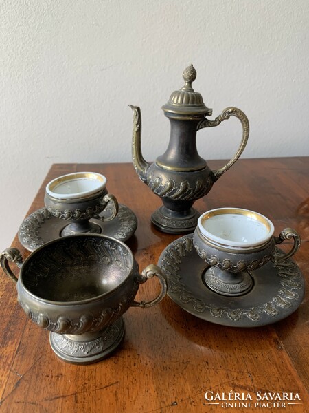Antique metal coffee cups with jug