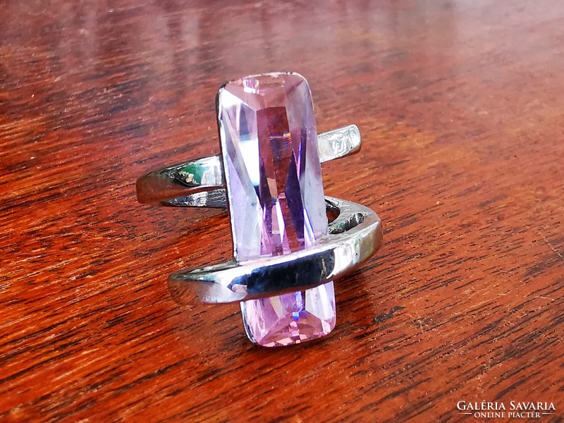 Stainless steel ring with pink stones