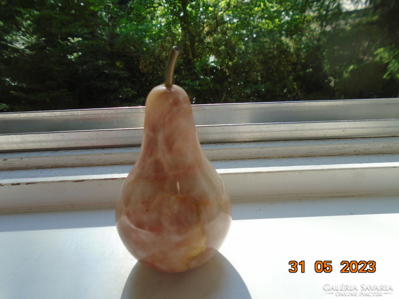 Polished onyx pear figure, sculpture with copper stem