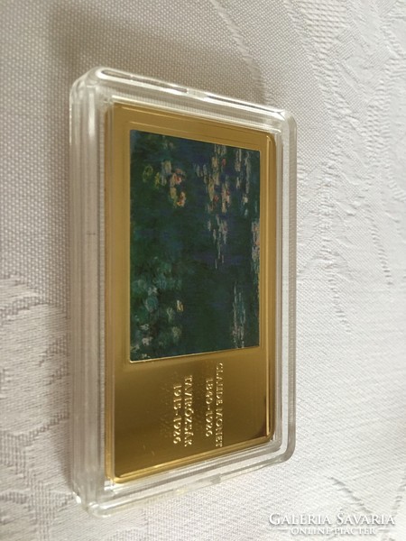 Claude Monet Tavirózsák c. képe. Arannyal bevont rúdon érme