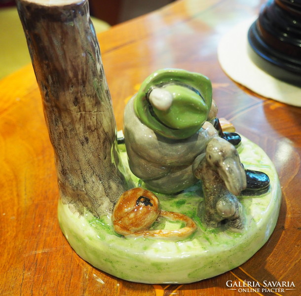 Izsépy pottery: hunter sleeping at the base of a tree, with a rabbit