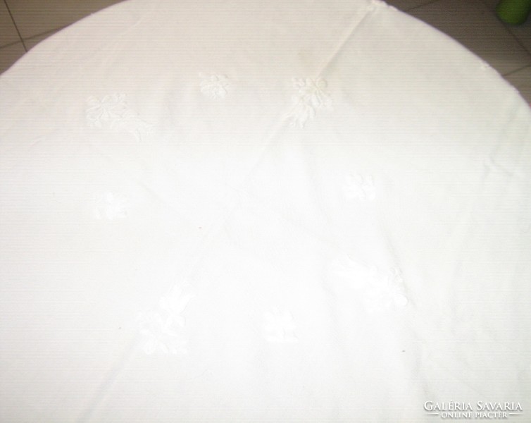 Beautiful white embroidered Kalocsa tablecloth with fringed edges