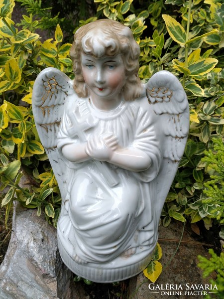 Antique German guardian angel with cross