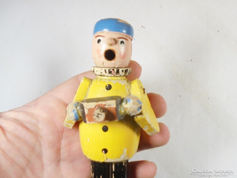 Retro old hand-painted wooden figure can be taken apart, smokes from the mouth