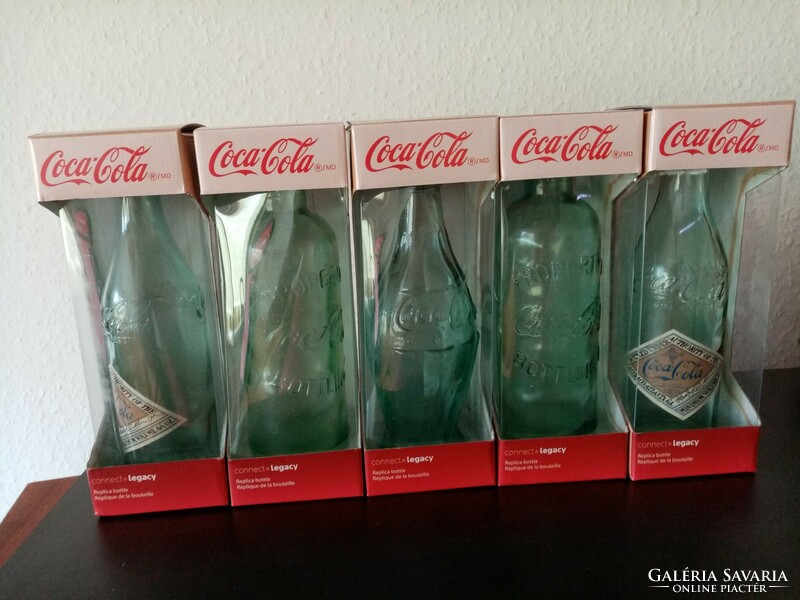 Antique coca cola replica bottles