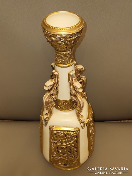 Zsolnay's historicizing openwork vase with mythological animal figures