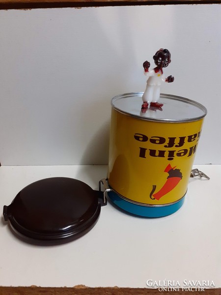 Nice condition julus meinl coffee plate box with a vinyl lid and a small nutmeg figure