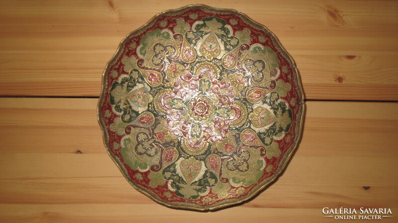 Copper serving bowl with an oriental motif