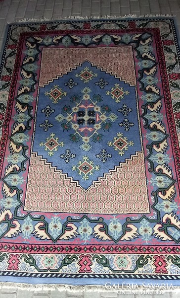 Hand-knotted Tunisian carpet is negotiable
