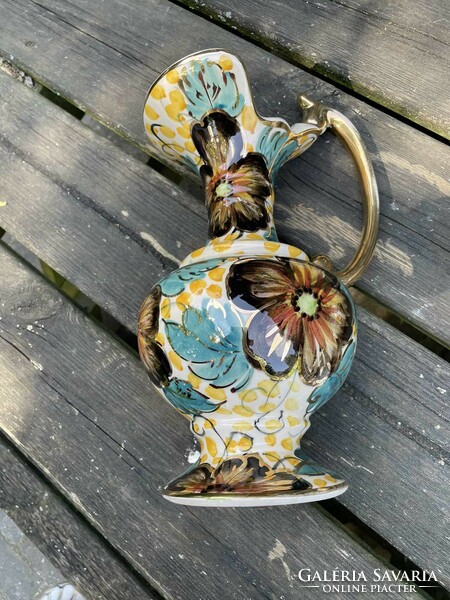 Old gold earthenware jug