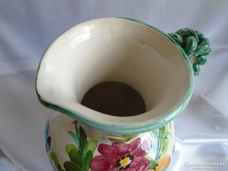 Italian ceramic jug. Its height is 25 cm