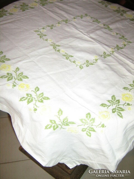 Beautiful cross-stitch hand-embroidered tablecloth with yellow roses