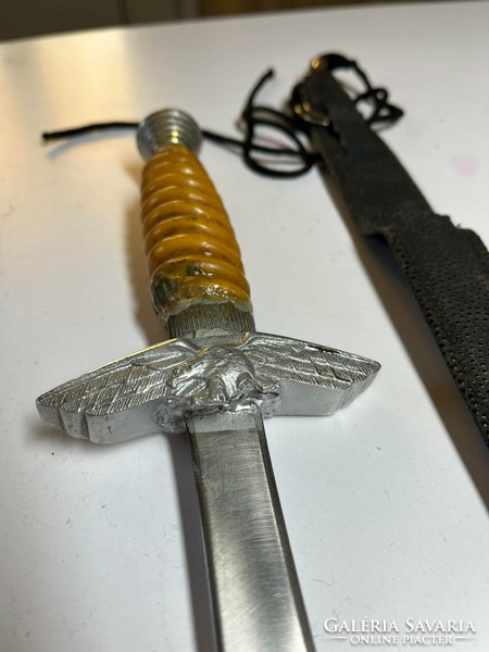Old dagger with eagle pattern