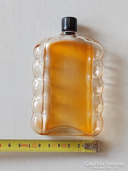 Old glass sunflower oil caola bronze oil retro bottle
