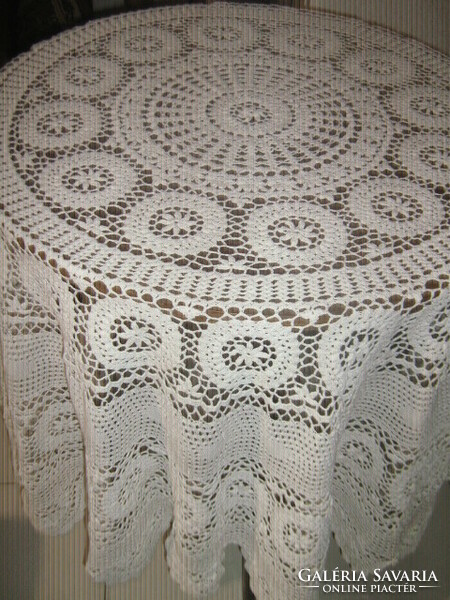 Beautiful hand-crocheted floral round tablecloth with white Art Nouveau features