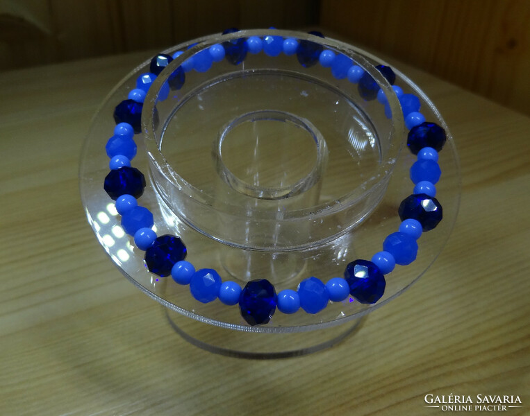 Complete bracelet made of blue polished crystal pearls, the tiny 4 mm glass pearl.