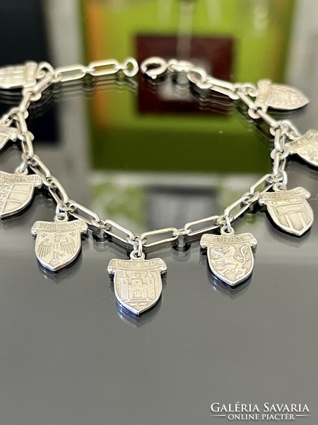 Solid silver bracelet with pendants